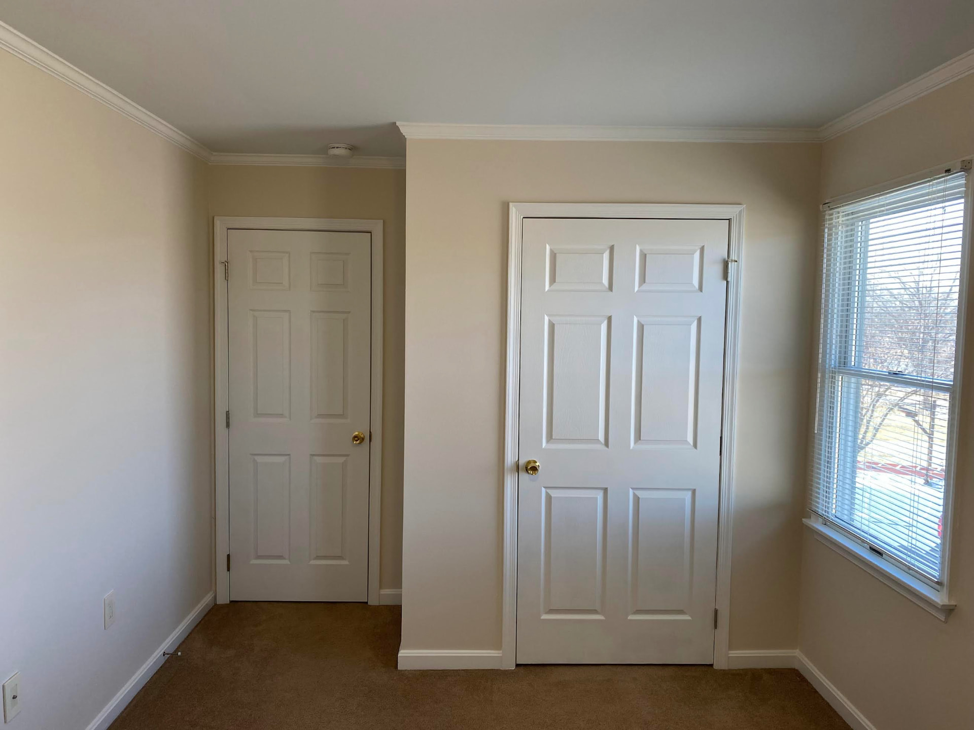 Bedroom repaint — bold red walls before 1